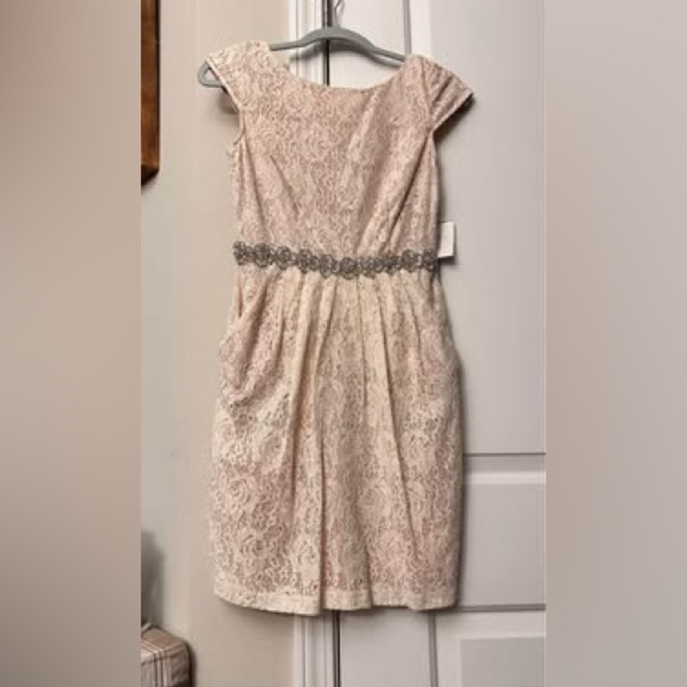 David Bridal NWT size 4 cap sleeve lace with beaded waist. Pockets